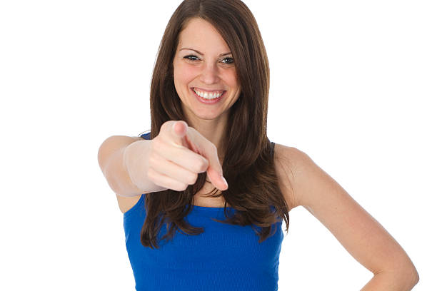 istock smiling girl pointing a camera 185328641