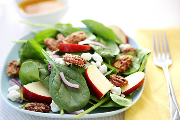 Mixed salad in a white bowl for lunch