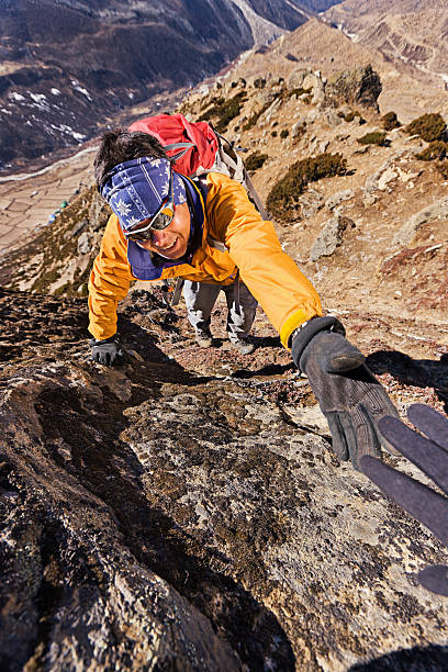 istock Nepali sherpa climbing in Himalayas 185329388