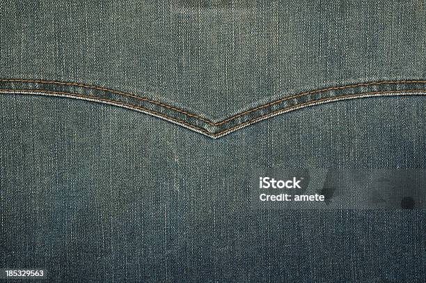 Foto de Denim Em Forma De Letra e mais fotos de stock de Jeans - Material Têxtil - Jeans - Material Têxtil, Lavado com Ácido, Algodão - Material Têxtil