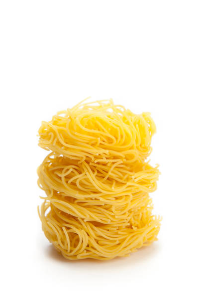 Pasta capelli d'angelo on white background stock photo