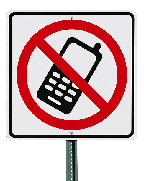 istock No Cell Phone Sign Post Isolated on White 185329856