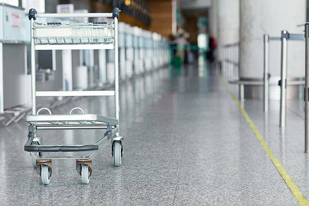 istock Luggge Trolley At The Airport 185330069
