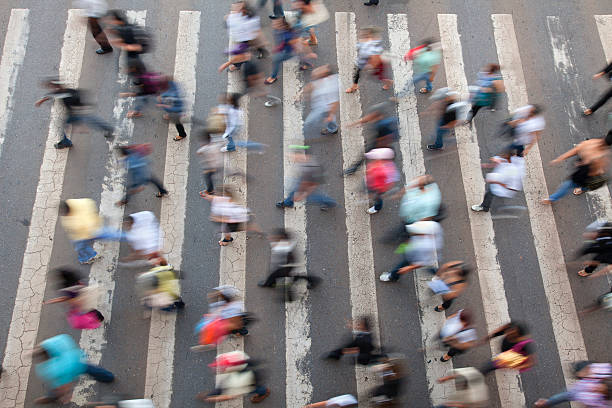 istock Birds eye view of blurred busy crosswalk 185330358