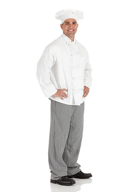 istock Happy male chef standing with arms akimbo 185330430