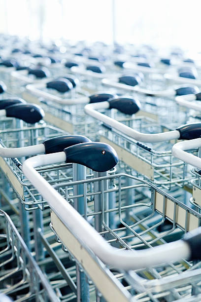 istock Group Of Luggage Trolleys 185330448