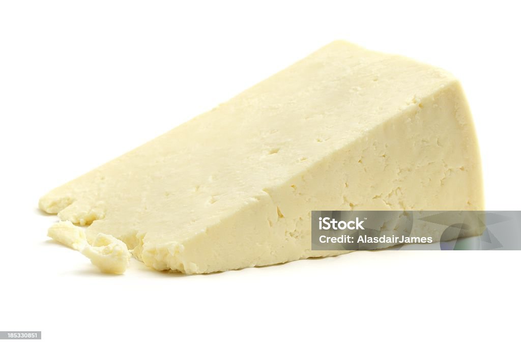 Cheshire Cheese Cheshire Cheese isolated on a white background. Cheese Stock Photo