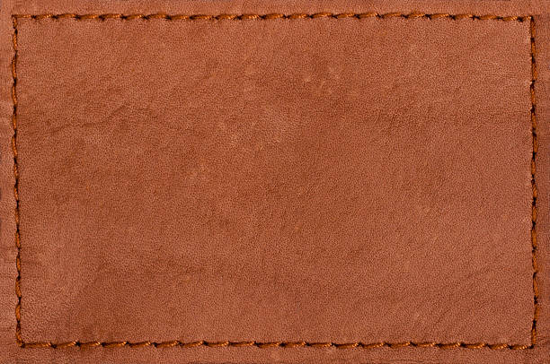 etiqueta de couro branco jeans - leather patch label stitch imagens e fotografias de stock