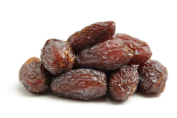 Medjool dates Medjool dates isolated on a white background. Medjool Date stock pictures, royalty-free photos & images