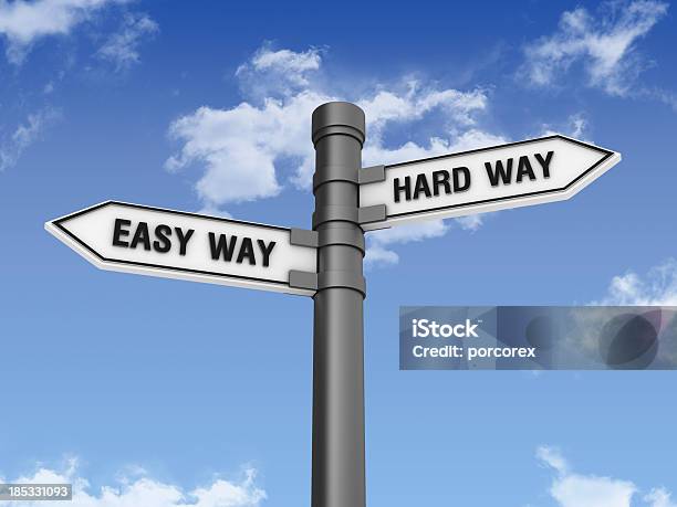 Directional Sign With Easy Hard Way And Sky Stock Photo - Download Image Now - Street, Effortless, Toughness