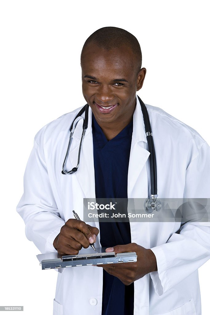 Médico escrevendo no gráfico de médicos - Royalty-free 20-29 Anos Foto de stock