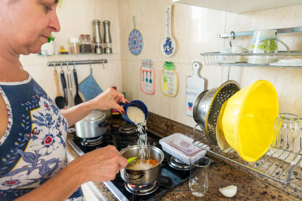 istock A woman in the kitchen making food. 1853315799