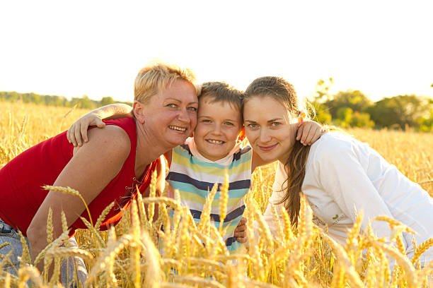 istock Happy family in wheat field 185331744