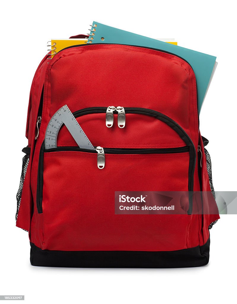 Backpack Isolated on a White Background This is a photo of a red backpack with school supplies isolated on a white background. Backpack Stock Photo