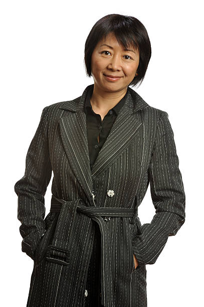 istock Chinese woman wearing raincoat 185332133