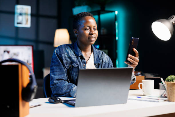 istock Woman checking email on smartphone 1853356251