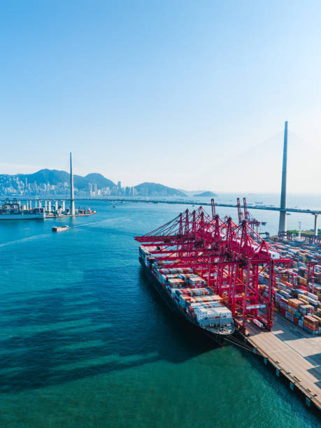 istock Container ship in import export and business logistic in Hong Kong 1853422927