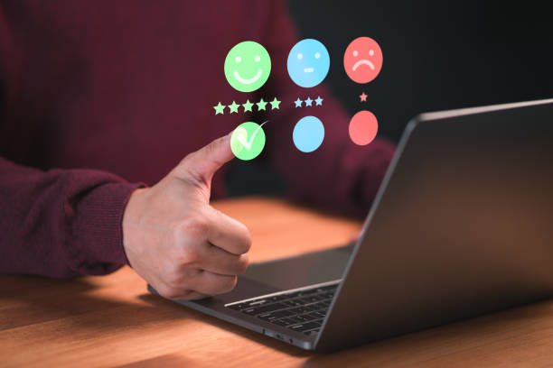 istock Customer touch virtual screen on smile face icon to give satisfaction in opinion and service. Customer satisfaction survey, service experience rating online application, testimonial feedback review. 1853463214