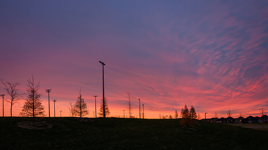 Sunrise on new community sports park at the eastern end of Markham, a suburban town in the north of cosmopolitan Toronto area.