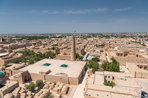 Minaret and madrasah of Islam-Khoja in the old Khiva. Close up background image with copy space for text