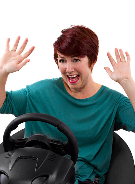 istock Young female driver on a white background in an accident 185365424
