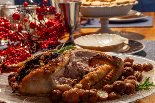 istock Roasted duck and stuffing on a holiday table 1853657885