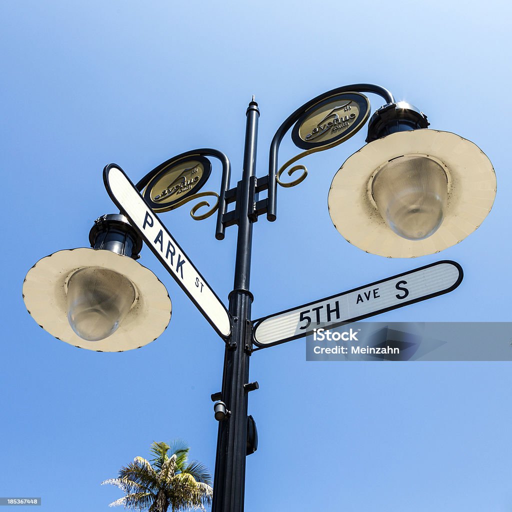 historical street sign in Naples, Florida under blue sky Avenue Stock Photo