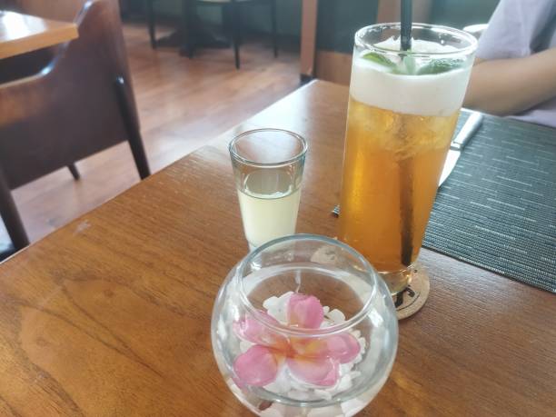 istock Lychee tea with bowl of flower 1853750496