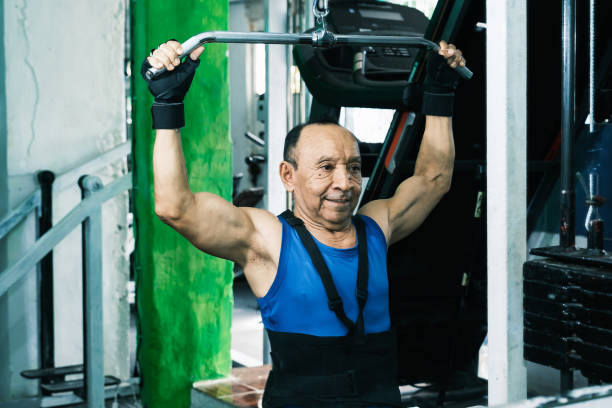 istock Elderly person exercising in gym 1853787559