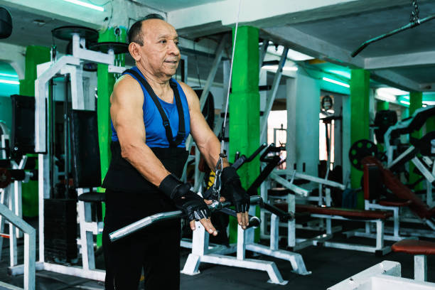 istock Elderly person exercising in gym 1853787564