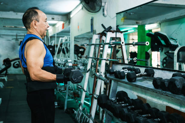 istock Elderly person exercising in gym 1853788082