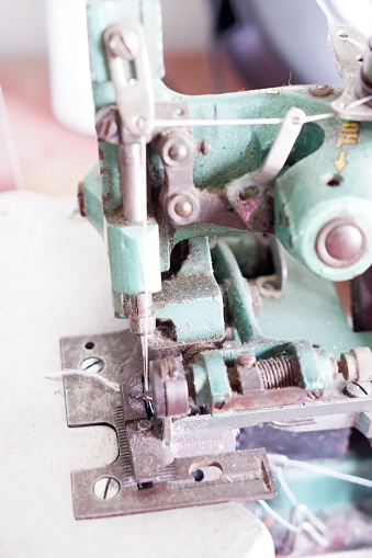 Close up detail of sewing machine. Selective focus. Shallow depth of field