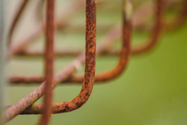 istock Close up of old and rusty iron fence 1854031145