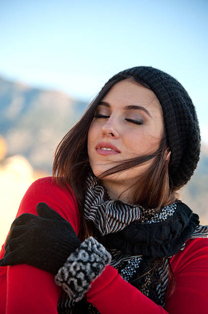 istock Dreamy Young Woman Outdoors in Winter 185404557