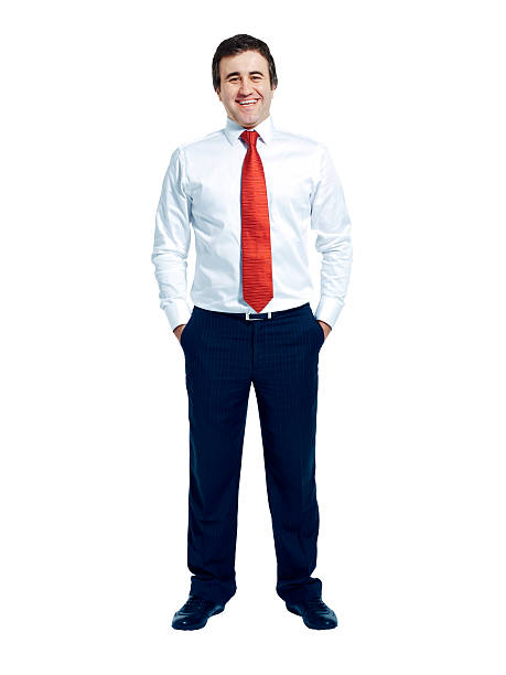 istock Happy businessman standing with hands in pockets 185404651