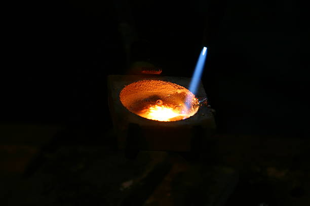 istock Gold being melt in a crucible 185405799