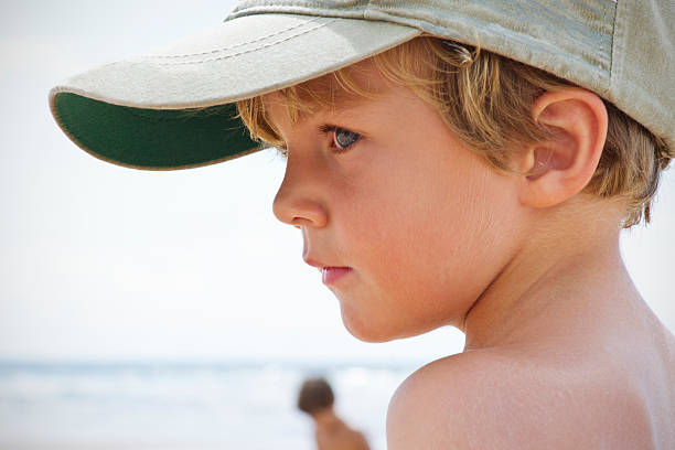 istock Little boy at the beach 185405990