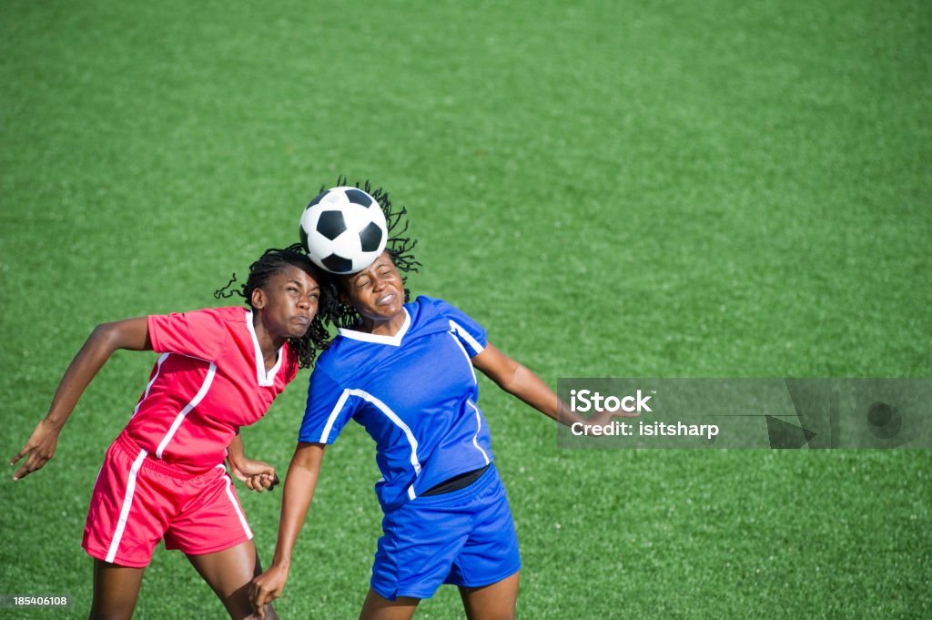 Soccer Action "Two female soccer players competing for the ball, aerial view." Soccer Ball Stock Photo