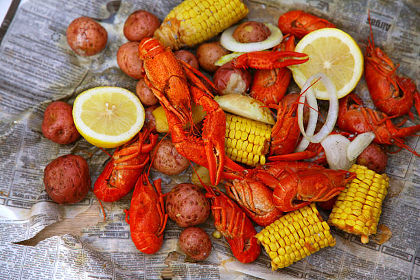 Louisiana crawfish boil Louisiana crawfish boil. cajun food photos stock pictures, royalty-free photos & images