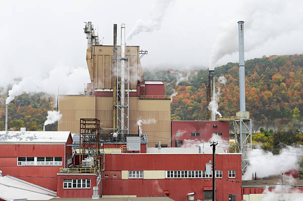 istock Modern Factory with Steam and Smoke Rising 185407803