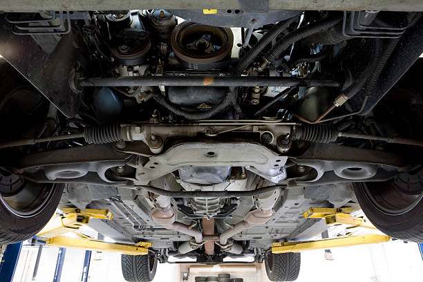 istock Underneath a car in a car repair 185407880