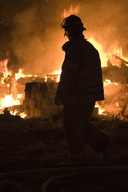 istock Silhouette of firefighter 185407891