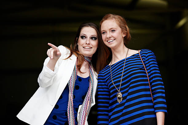 istock Two female fashion models posing together 185408283