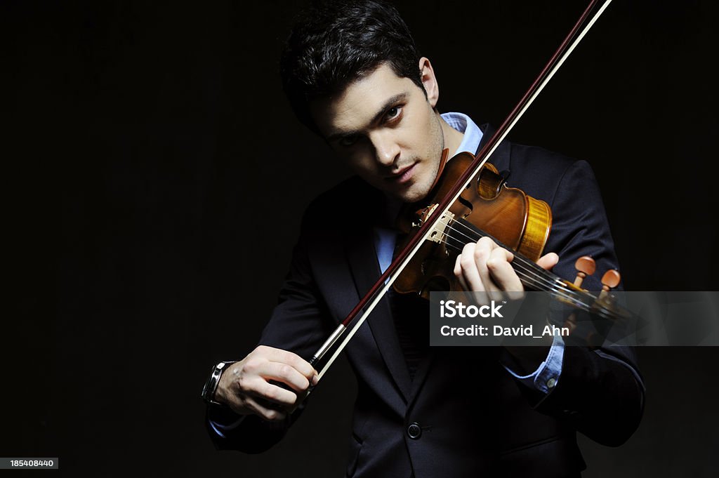 Young violinist Young violinist. Selective focus. 20-29 Years Stock Photo