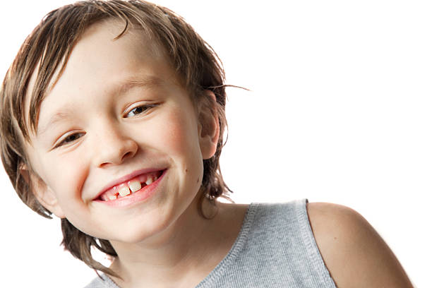 Happy boy. A nine-year-old boy fun laughs. On a white background. child laughing hysterically stock pictures, royalty-free photos & images