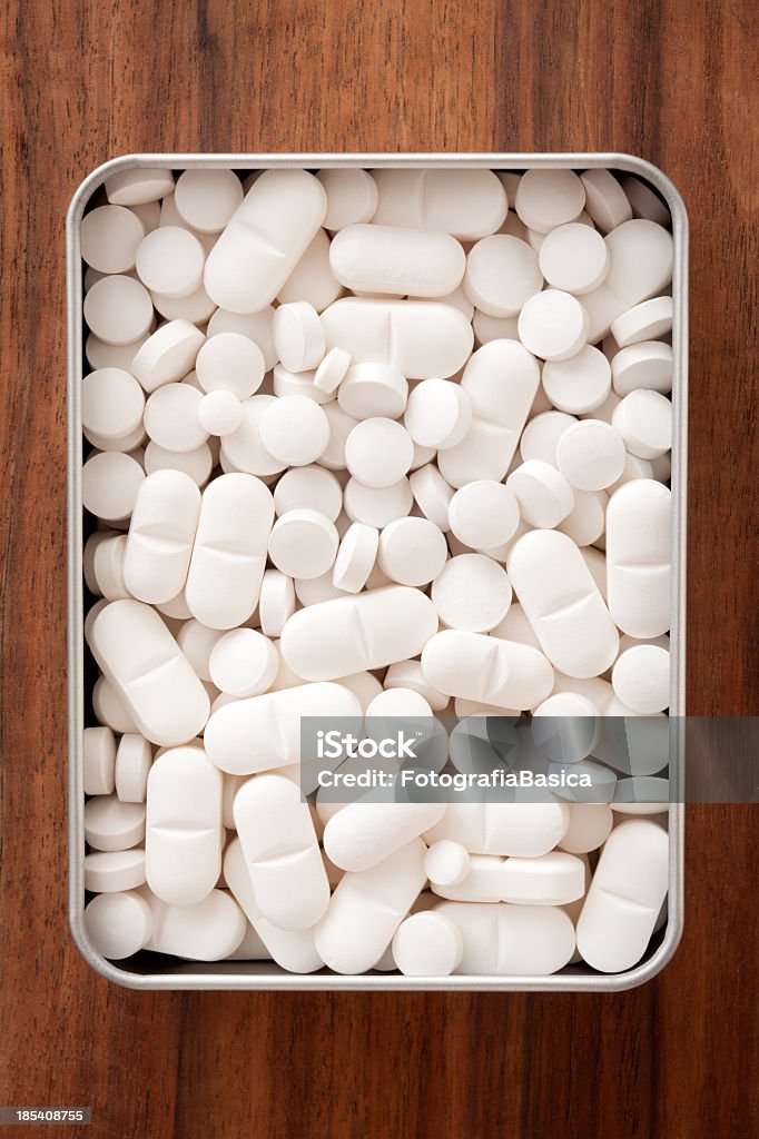 Pillole bianchi in scatola - Foto stock royalty-free di Abbondanza