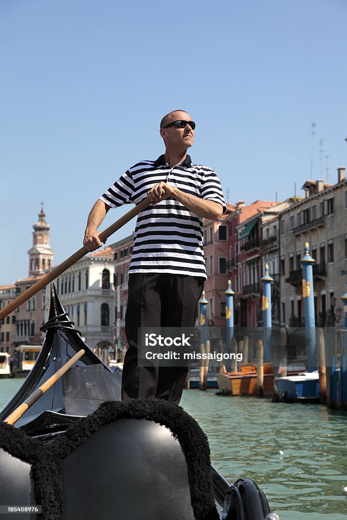 Gondolier w Wenecja - Zbiór zdjęć royalty-free (Gondolier)