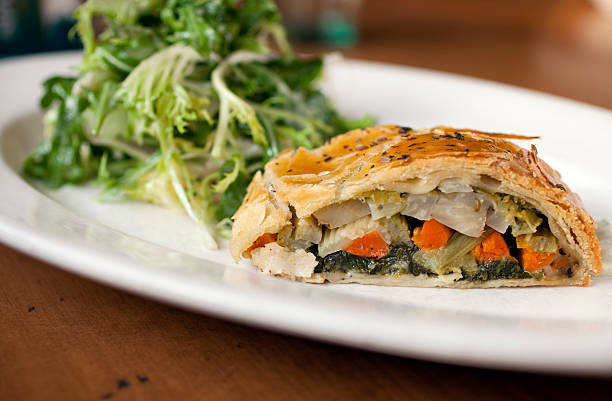 vegetable strudel savory vegetable strudel with a side salad strudel stock pictures, royalty-free photos & images