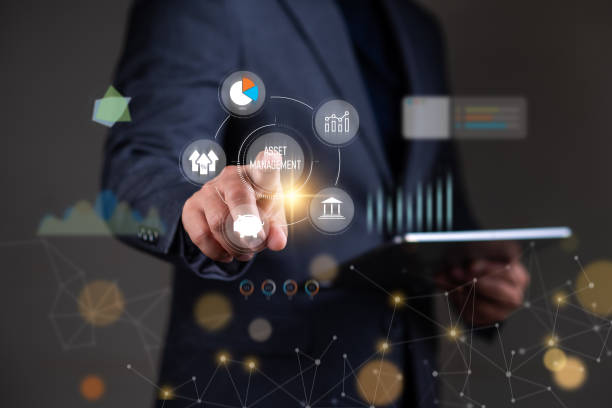 istock Asset management concept, Man using tablet with word asset management and Icon  on virtual display. Financial Property Digital assets. 1854114853