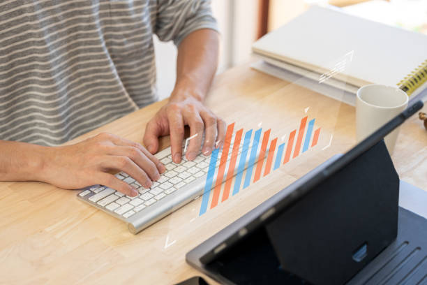 istock analysis strategy with discussing a financial planning graph and company budget during a budget meeting in office room. 1854126512